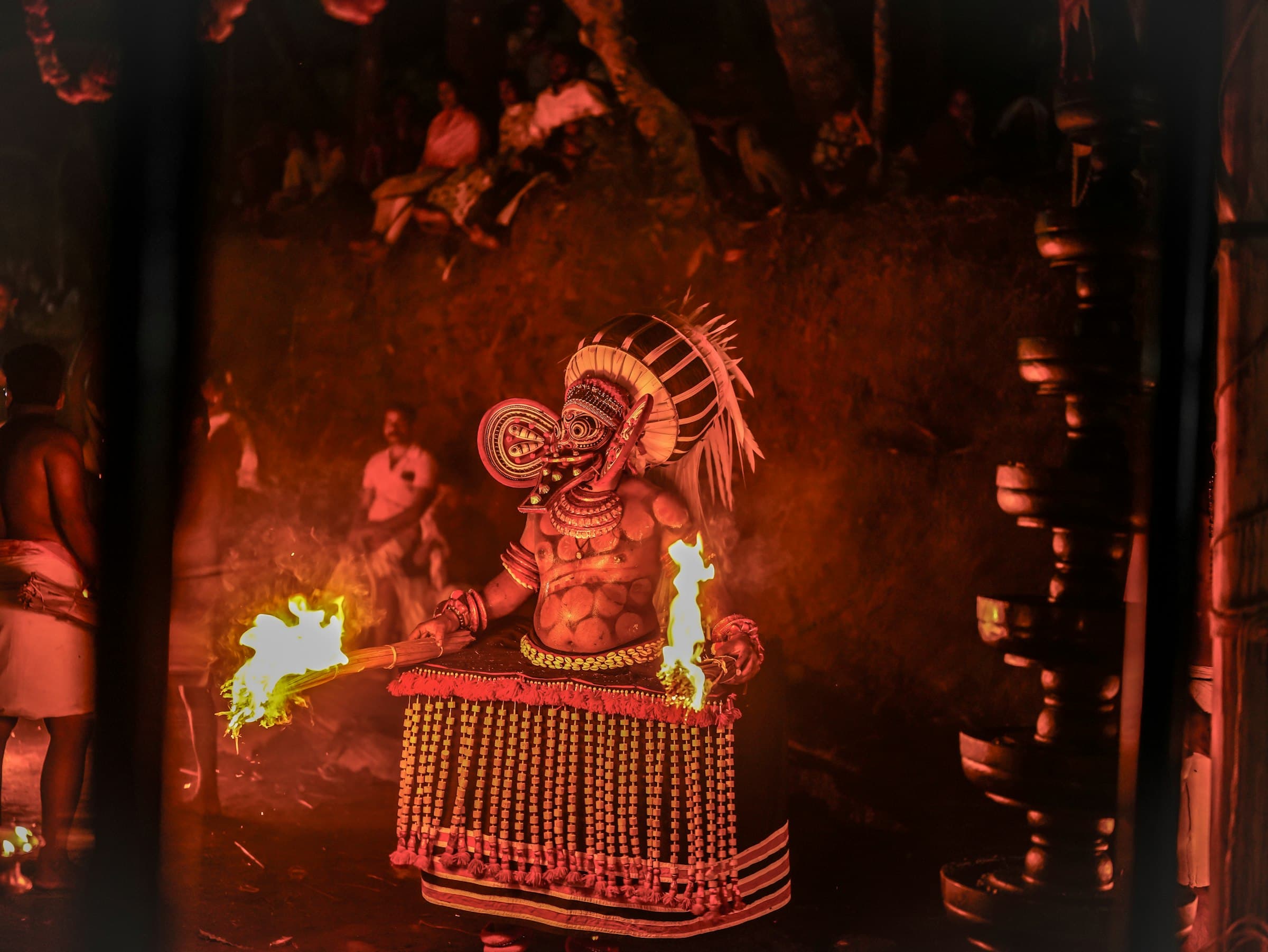 Theyyam ritual fire performance